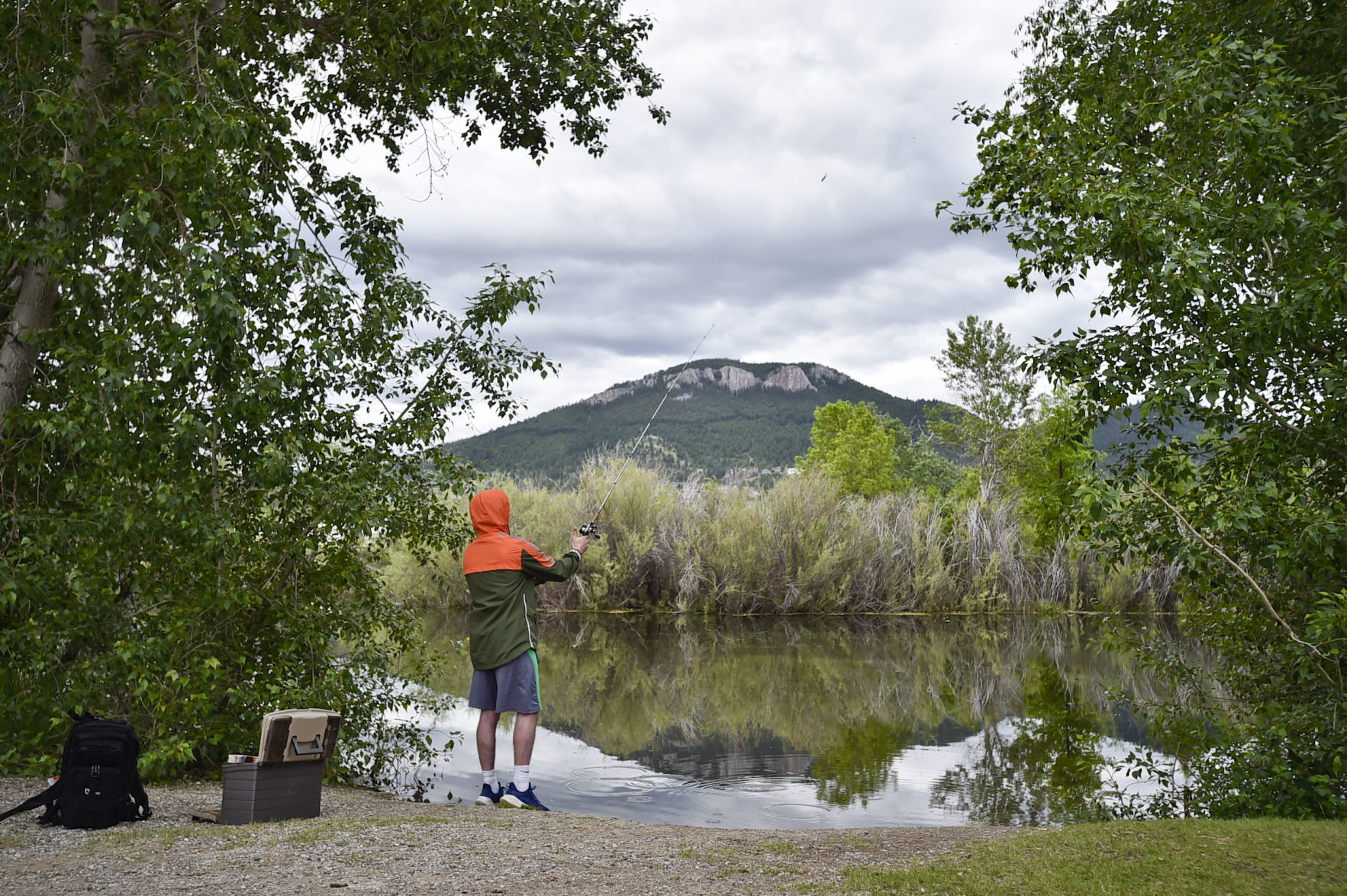 Garrett Little casts a lure into Spring Meadow Lake